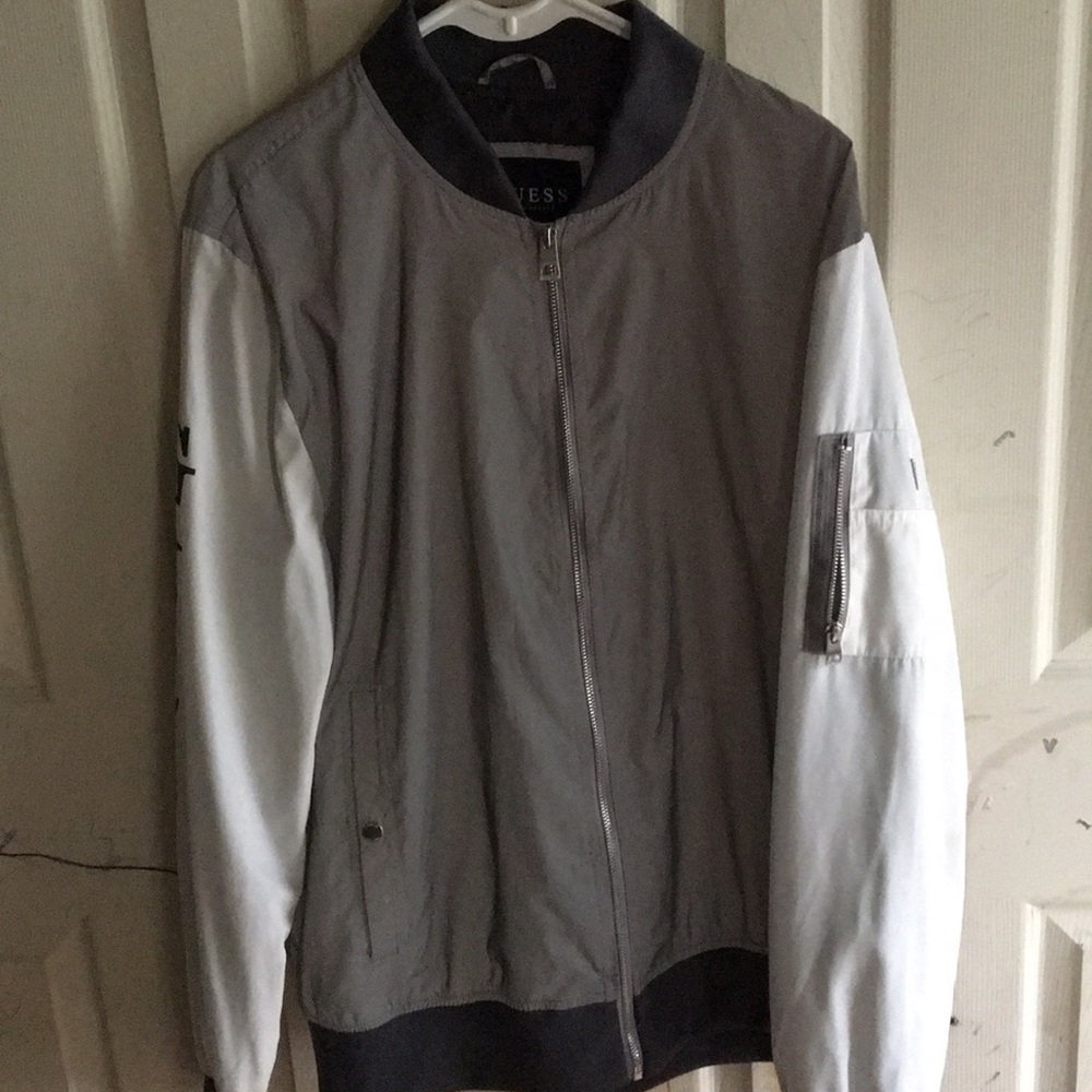 Reflective guess bomber jacket.